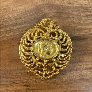 Vintage Gold Brooch with Intricate Design